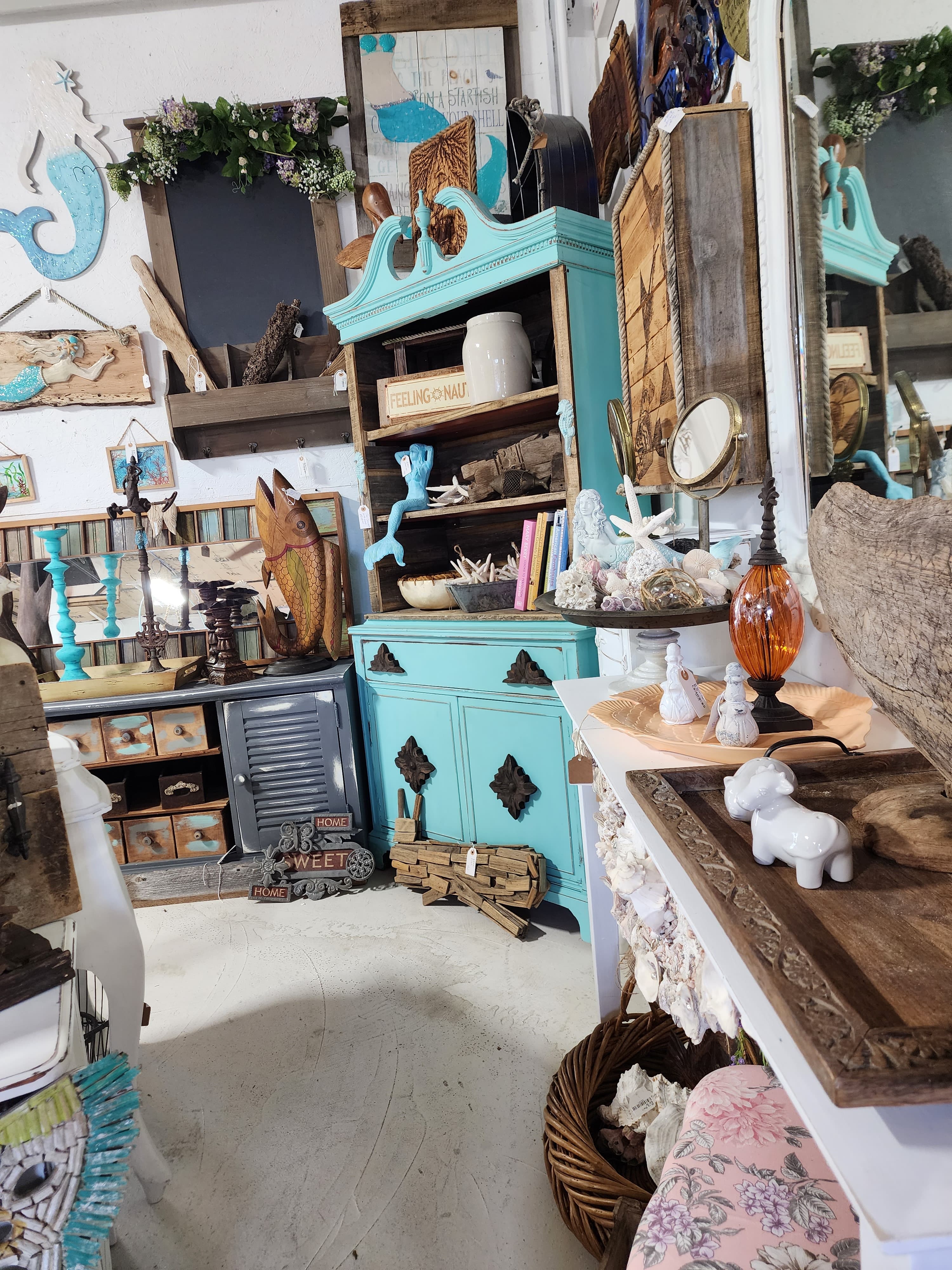 Inside The Blue Flamingo, vintage decor and renewed furniture on display